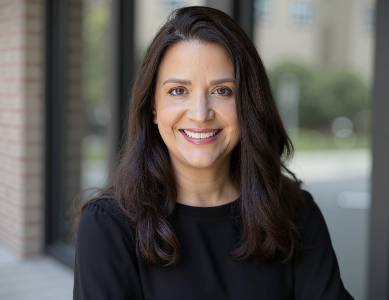 Professional portrait of realtor Andrea Castellanos